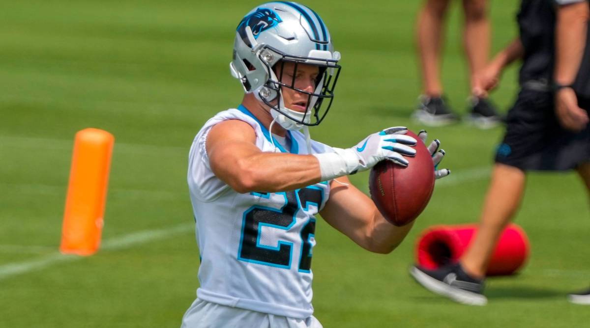 Panthers running back Christian McCaffrey catches a pass in practice during training camp.
